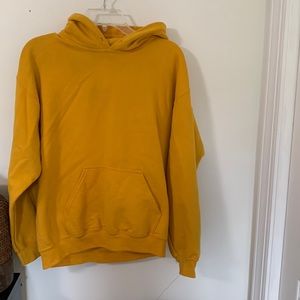 Super comfortable yellow hoodie with pocket!